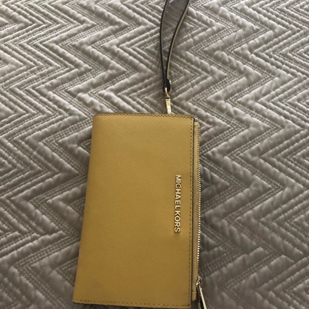 Michael Kors wristlet. Leather.